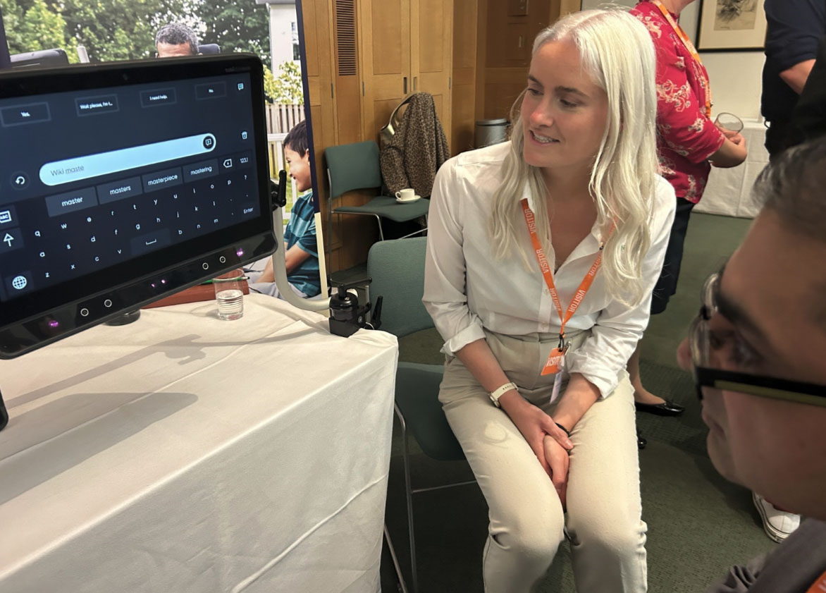 woman looks at screen