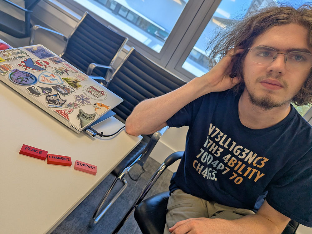 young man with Talk Tiles