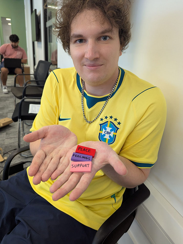 young man with Talk Tiles