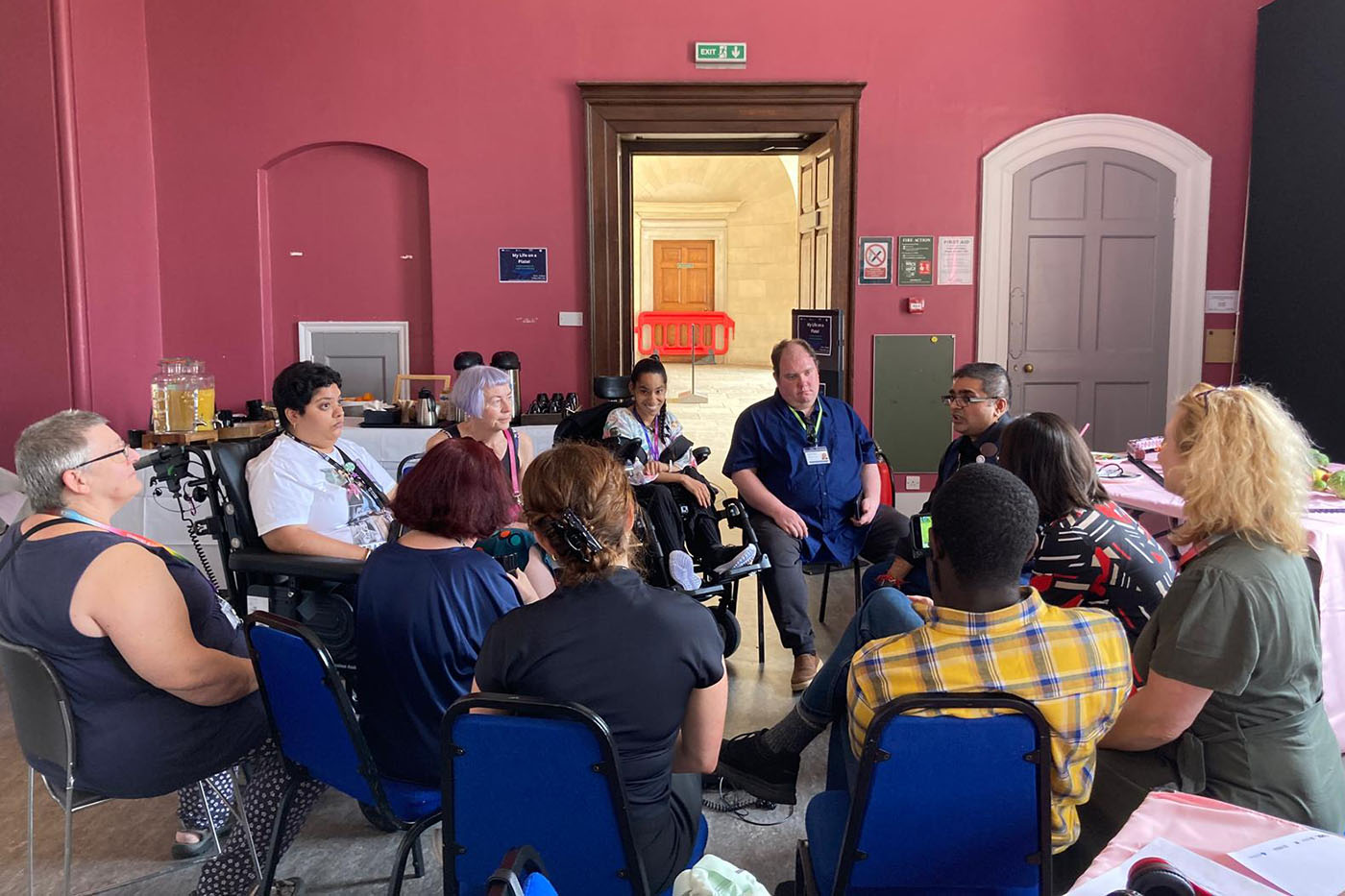 a group of people sat in a circle
