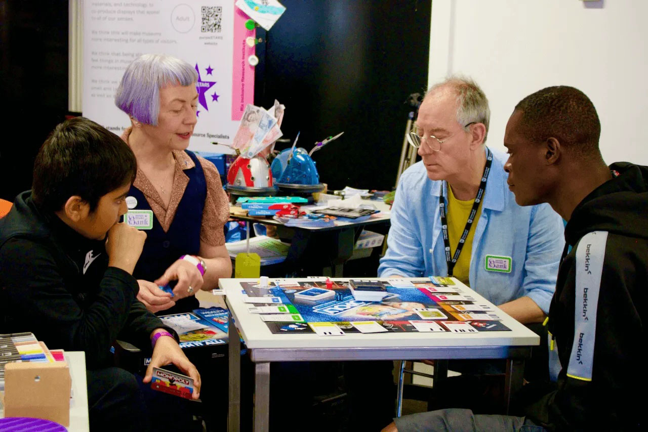 people playing Monopoly