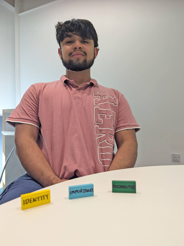 young man with Talk Tiles