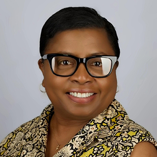 headshot of Paulet Brown-Wilsher