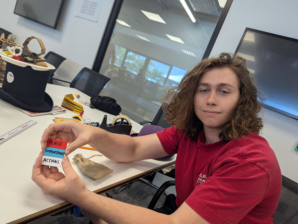 young man with Talk Tiles