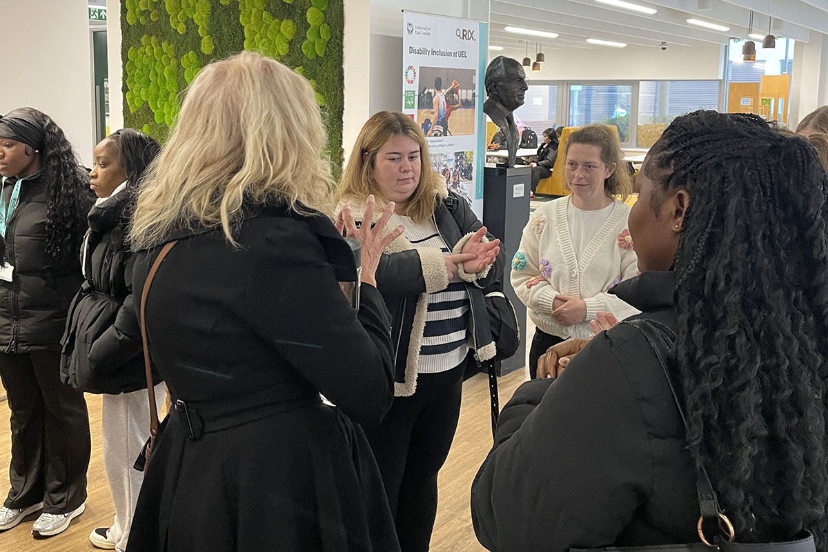 women at signing event